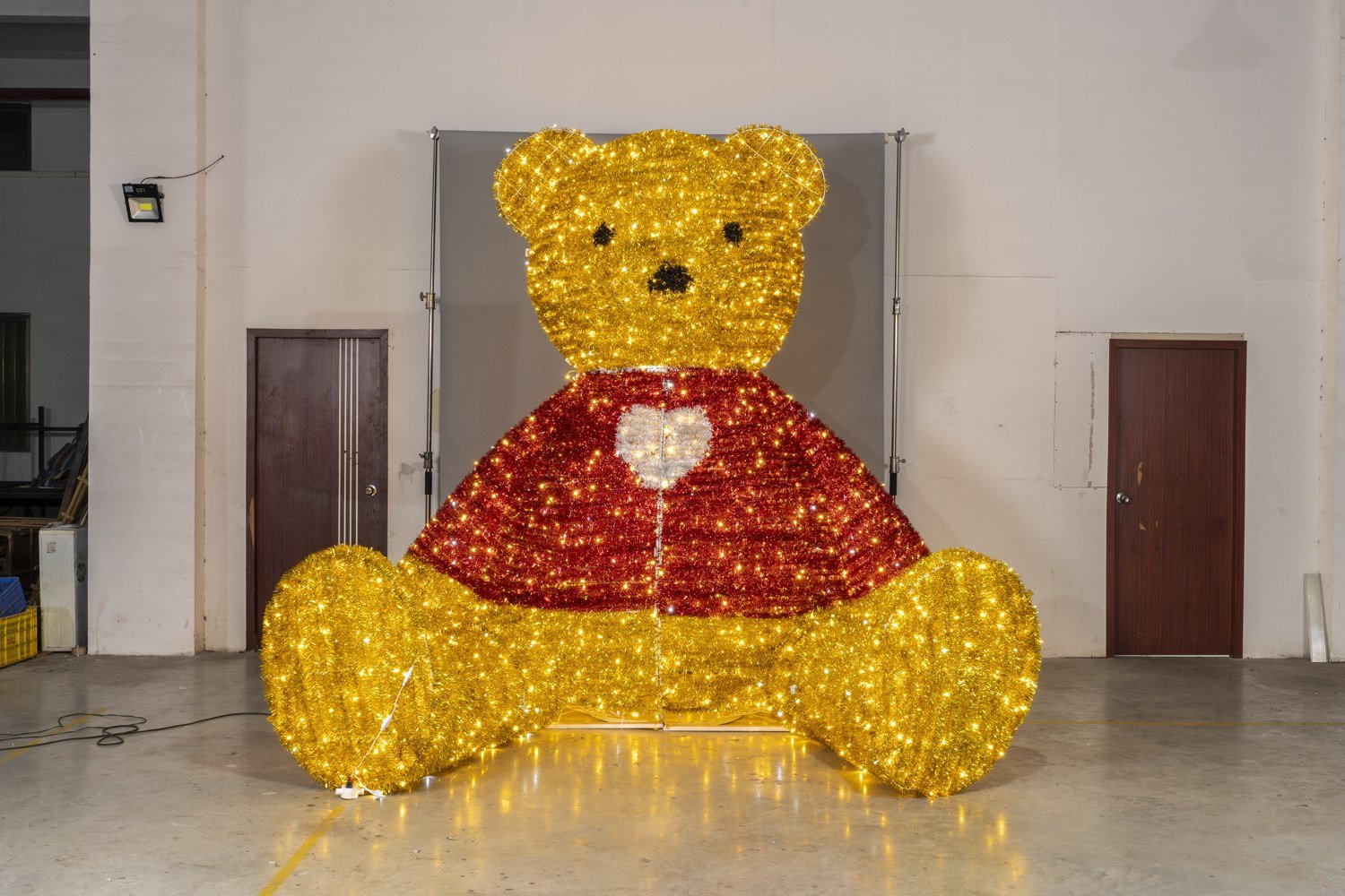 Illuminated bear sculpture showing its manufactured form
